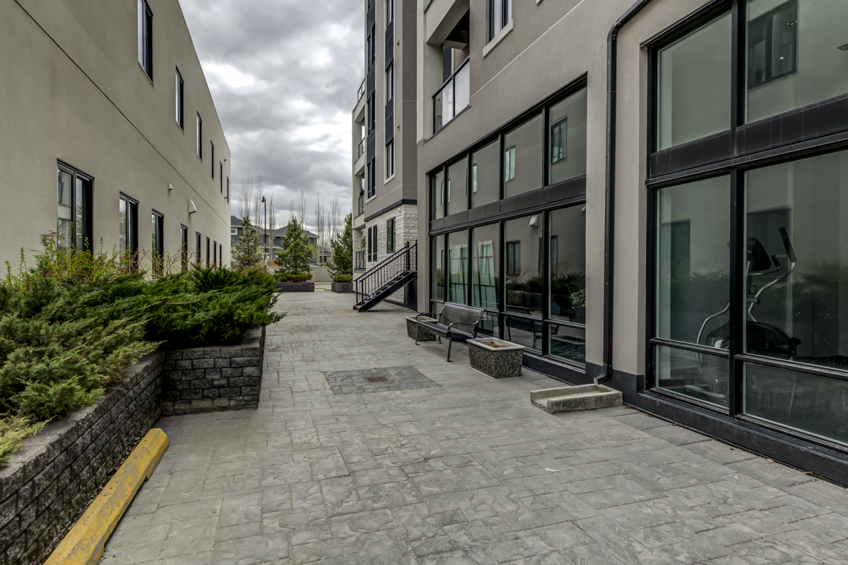 Image showcasing ICONIC YEG : Windermere Multi-Level Condo with Private Elevator